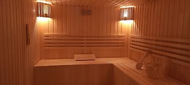 tam insaat: Sauna tikintisi, sunaların yığılması saunaların hazırlanması — 3