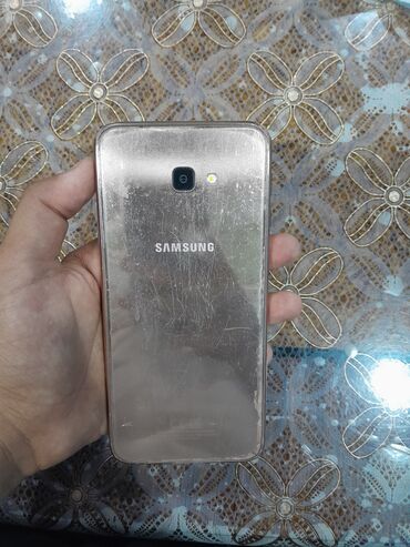 Samsung: Samsung Galaxy J4 Plus, 16 GB, rəng - Qızılı, Barmaq izi, İki sim kartlı, Face ID
