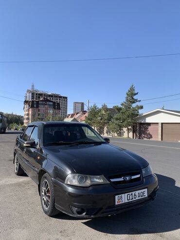 оборудование для автомойки цены в бишкеке: Седан Daewoo Nexia черного цвета. Автомобиль оснащен двигателем