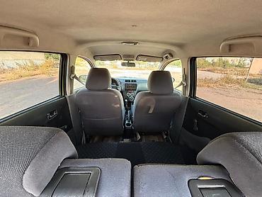Daihatsu Cuore: 2008 г., 1 л, Механика, Бензин, Хэтчбэк — 9