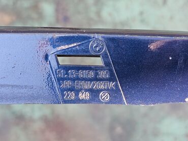 Другие детали кузова: BMW E39, правая накладка между фарой и бампером. В наличии только — 14