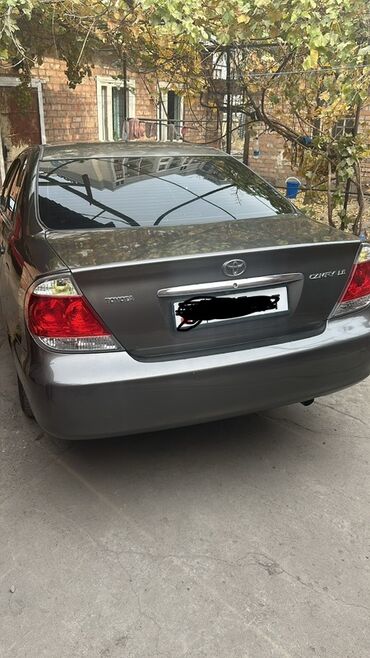 купить машину в рассрочку без банка: Toyota Camry: 2006 г., 2.4 л, Автомат, Бензин, Седан
