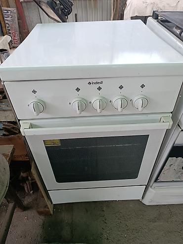 Техника для кухни: Электрические плиты, Indesit, Б/у, Напольная, Механическая — 1