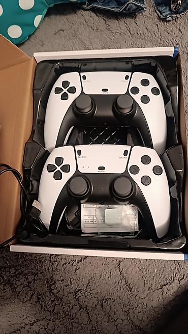 Ретро консоли: Игровая консоль Game Stick Pro 4K с двумя беспроводными геймпадами — 2