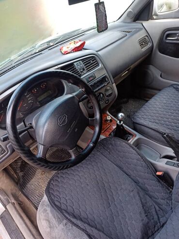 резина диска: Nissan Almera (седан), серебристый цвет, номерные знаки KG 781 AOQ