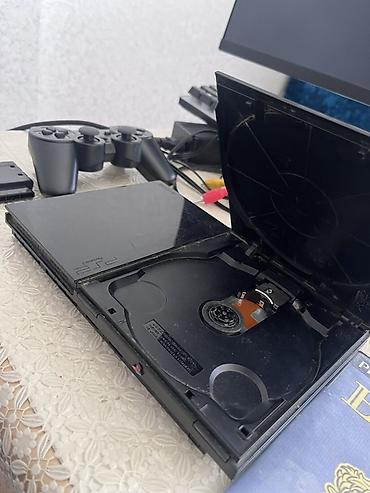 PS2 & PS1 (Sony PlayStation 2 & 1): Sony PlayStation 2 Slim komplekti (SCPH-90004, PAL) Paketdə: - PS2 — 2