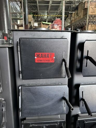 печь под казан: Металлическая печь для отопления помещений. Оснащена несколькими