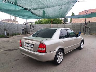 Mazda: Mazda 323: 2003 г., 1.6 л, Автомат, Бензин, Седан