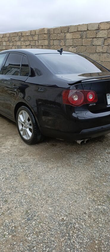 Volkswagen: Volkswagen Jetta: 2 l | 2009 il Sedan — 5