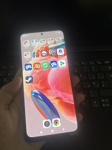 редми ноот 7: Смартфон Redmi (серия Note 12/11-поколение, судя по дизайну) в синем — 1