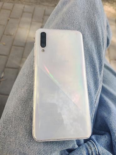 redmi note 10 qiymət: Samsung Galaxy A30s, rəng - Ağ, Barmaq izi — 2
