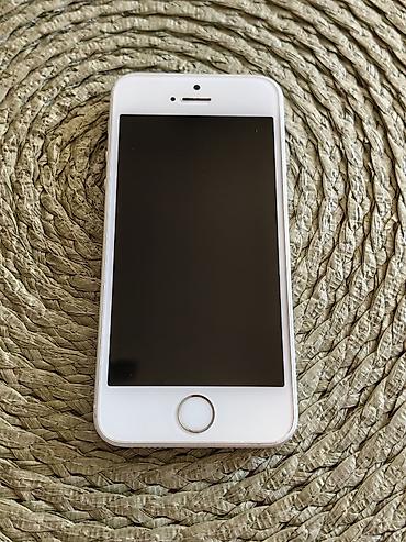 o bag: Iphone SE 2016 beli sa 64 gb memorije, otključan za sve mreže. Telefon — 1