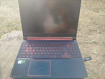 lenovo log: Игровой ноутбук Acer Nitro 5 (серия AN5xx) в черно-красном дизайне — 4