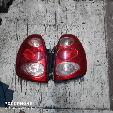 тюнинг фар опель фронтера: Комплект стоп-сигналов Daihatsu 2003 г., Оригинал