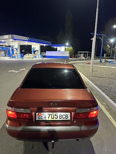 глушитель ауди: Mazda 626: 1998 г., 1.8 л, Механика, Бензин, Седан — 8