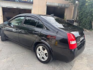 Транспорт: Nissan Primera: 2 л | 2005 г. Седан — 9