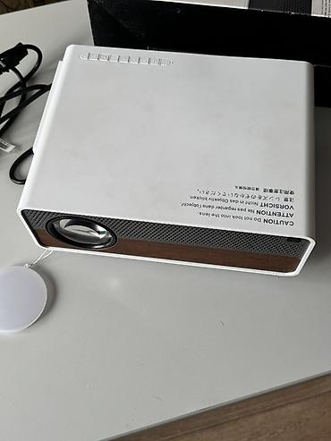 Проекторы: Проектор для домашнего кинотеатра - Компактный LED‑проектор «Home — 3