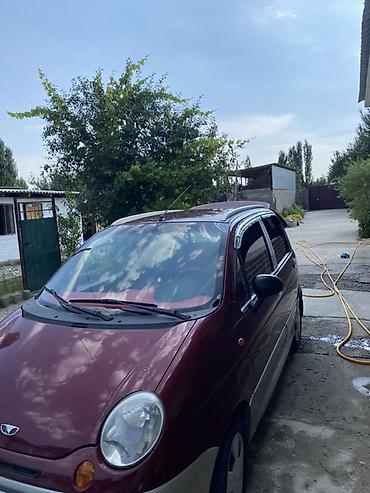 красный материал: Daewoo Matiz: 2007 г., 0.1 л, Механика, Бензин, Хэтчбэк — 5