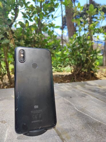 телефон флай нимбус 8: Xiaomi Mi A2, 128 ГБ, цвет - Черный, 
 Кнопочный, Отпечаток пальца, Face ID
