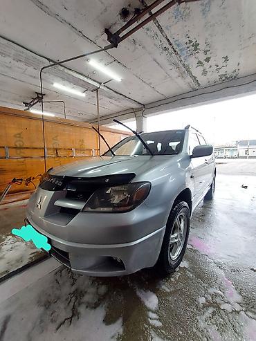 Mitsubishi: Mitsubishi Outlander: 2003 г., 2 л, Механика, Газ, Кроссовер — 1