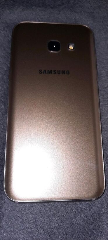 a3 2017 qiymeti: Samsung Galaxy A3, 16 ГБ, цвет - Золотой, Сенсорный, Отпечаток пальца, Две SIM карты
