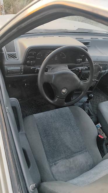 Daewoo Nexia: 2005 г., Кол менен иштөөчү, Бензин, Седан — 6