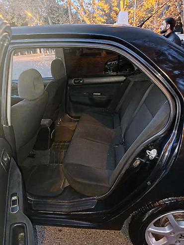 w202 qapı: Mitsubishi Lancer: 1.6 l | 2005 il 290000 km Sedan — 8