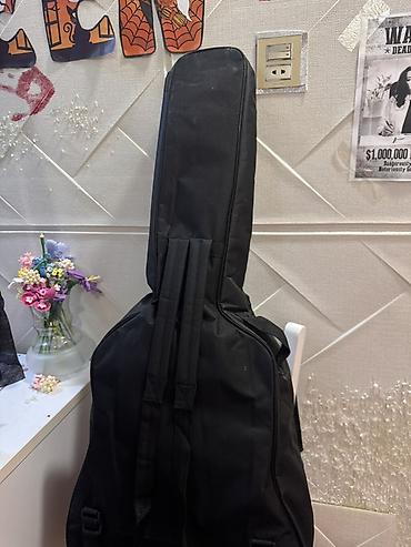 gitara: Akustik gitar – dreadnought korpus, cutaway (kalka) dizaynı - Korpus — 6