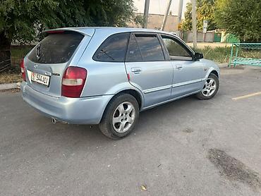 byd bot 384: Mazda 323: 2001 г., 1.6 л, Механика, Бензин, Универсал — 4