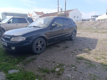 сполер мазда демио: Mazda Familia: 1999 г., 1.6 л, Автомат, Бензин