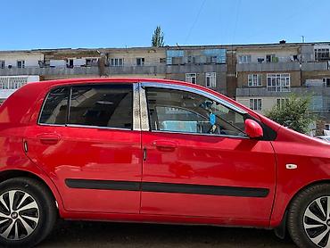 рул: Hyundai Getz: 2004 г., 1.4 л, Автомат, Бензин, Хетчбек — 2