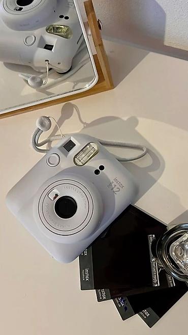 mini proyektorlar: Fujifilm Instax Mini 12 ani fotoaparat. Kompakt və istifadəsi rahat — 1