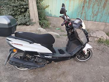 neta gt: Скутер Yamaha (50–150 см³, по классу/размеру) в спортивном стиле — 4