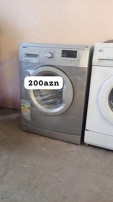 Beko önyükləməli paltaryuyan maşın - Rəng: gümüşü - Enerji sinfi: A