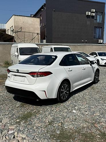 Продажа авто: Toyota Corolla: 2023 г., 1.8 л, Автомат, Гибрид, Седан — 5