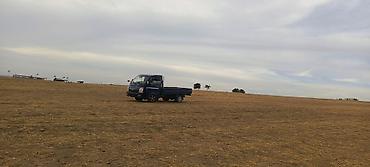 Грузовой малотоннажный бортовой автомобиль (кабина над двигателем), с