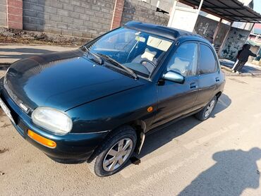 Mazda: Mazda 121: 1991 г., 1.3 л, Бензин, Седан