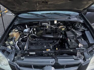 Mazda: Mazda Tribute: 2001 г., 2 л, Механика, Бензин, Кроссовер — 9