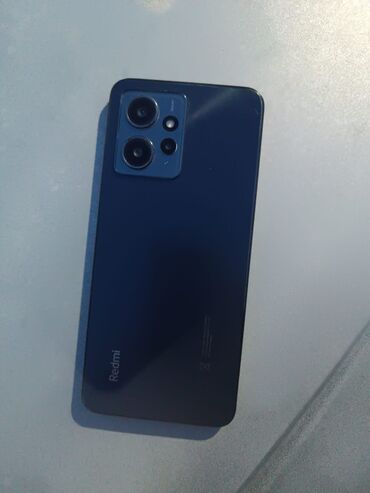 telefo: Xiaomi Redmi Note 12, 128 ГБ, цвет - Голубой, 
 Отпечаток пальца, Две SIM карты, Face ID