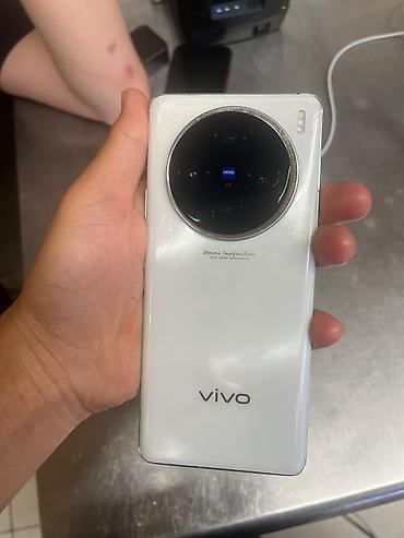 телефоны vivo: Vivo X100 (белый) — флагманский смартфон с оптикой ZEISS - Дисплей — 1