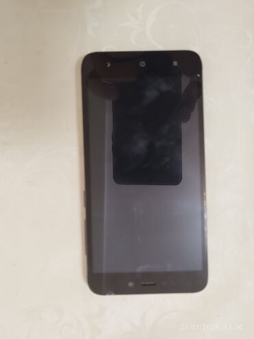 телефон fly iq4503: Xiaomi Redmi 4X, 32 ГБ, цвет - Черный, 
 Отпечаток пальца, Две SIM карты