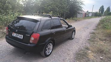 mazda cx: Mazda 323: 2003 г., 1.6 л, Механика, Бензин, Хэтчбэк — 3