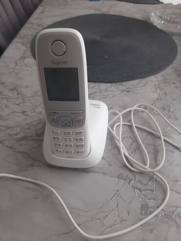 satiliq telefonlar: Стационарный телефон