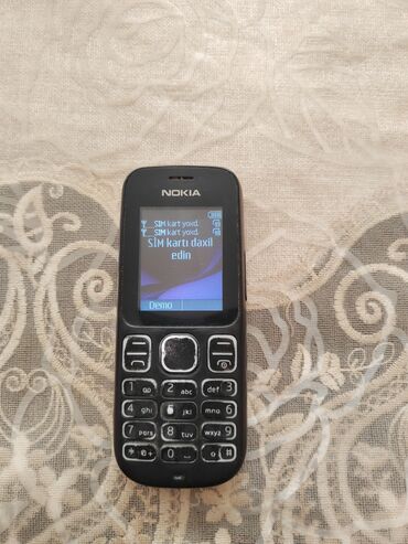 yeni paltaryuyan: Nokia 106, rəng - Qara, Düyməli, İki sim kartlı