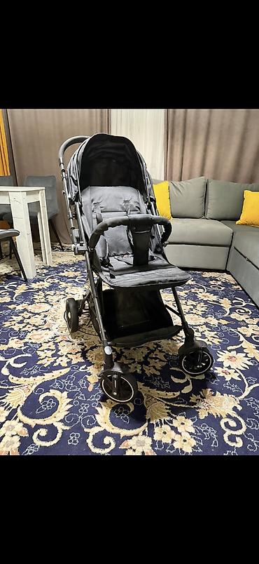 Коляски: Коляска (черная), складная Особенности: - Легкая алюминиевая рама — 6