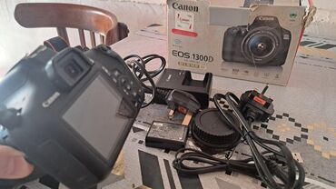 Fotokameralar: Canon EOS 1300D DSLR fotoaparat dəsti Xüsusiyyətlər: - Korpus: Canon — 5