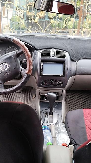 mazda 2000: Mazda 323: 2002 г., 1.6 л, Автомат, Бензин, Универсал — 2