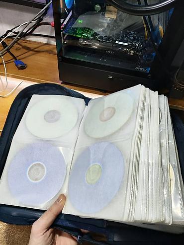 CD, DVD диски: Папки для дисков. Цена указана за 1 папку. Вместительность одной папки — 7