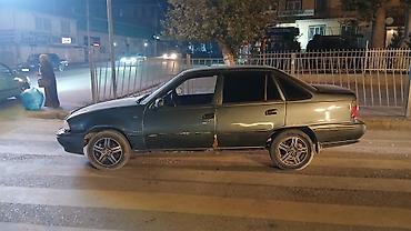 автомобиль пассат: Daewoo Nexia: 2002 г., Кол менен иштөөчү, Бензин — 3