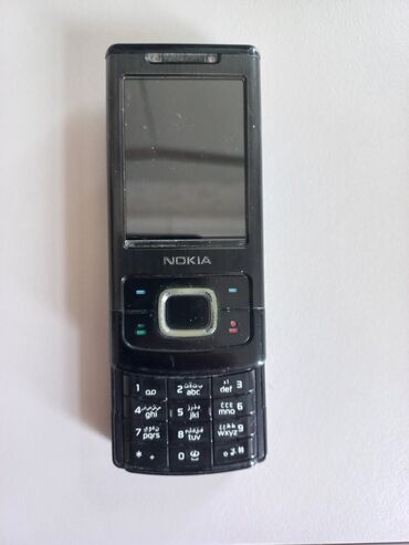 sadə nokia: Nokia 6700 Slide, rəng - Qara, Düyməli